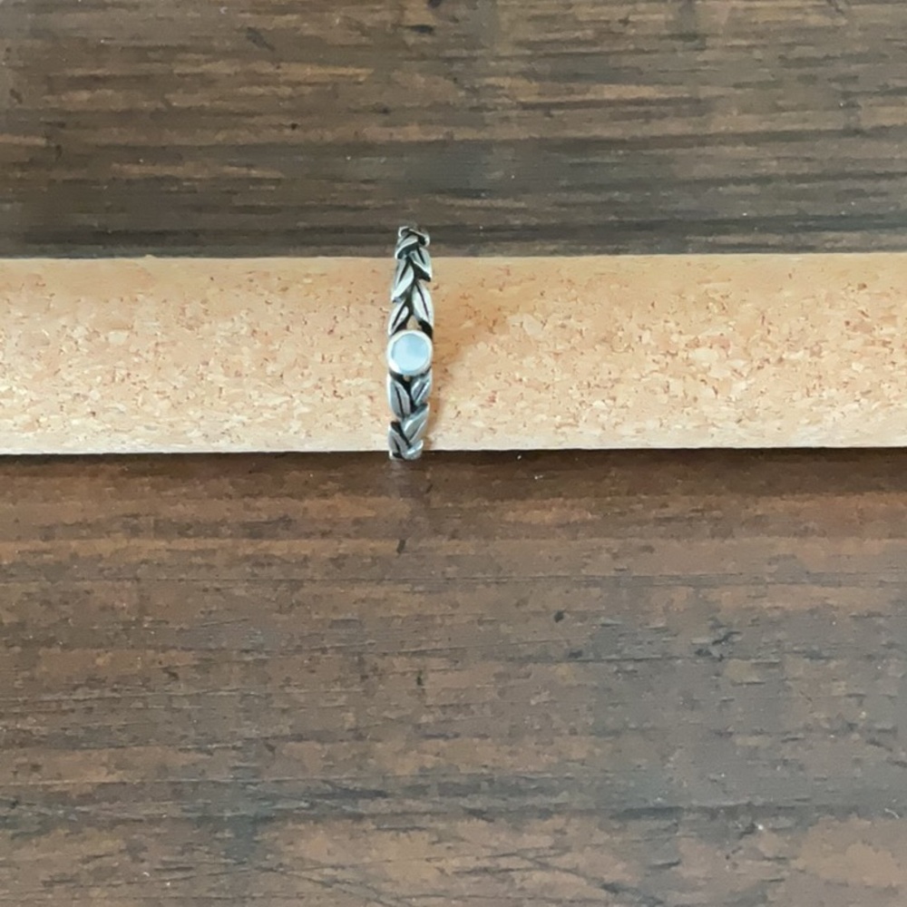 Pandora ring with milky pearl stone